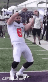 Man In Football Uniform Dancing On Field GIF