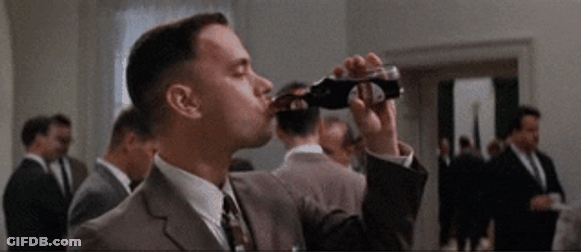 Man In Formal Attire Drinking Dr Pepper GIF