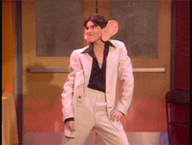 Man In Formal Suit With Huge Ears GIF