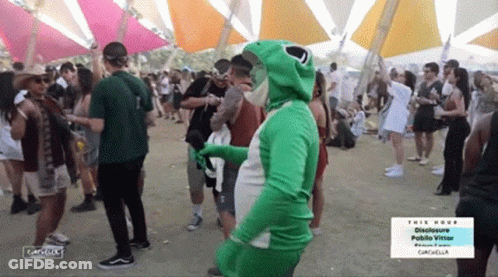 Man In Frog Costume Dancing At Festival GIF