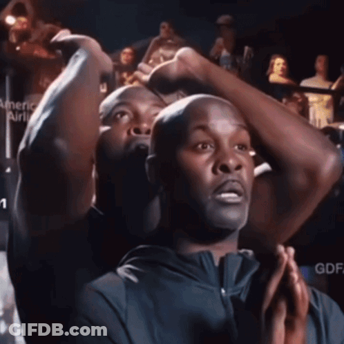 Man In Front Of American Airlines Sign GIF