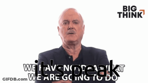 Man In Front Of Big Think Sign GIF