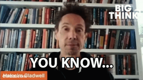 Man In Front Of Bookshelf Says You Know GIF