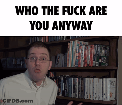 Man In Front Of Bookshelf Who The Fuck Are You Anyway GIF