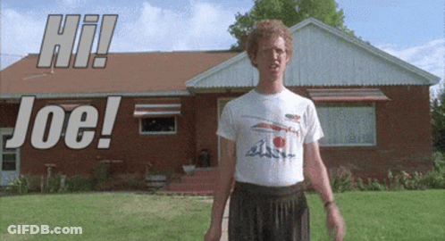 Man In Front Of Brick House Hi Joe GIF