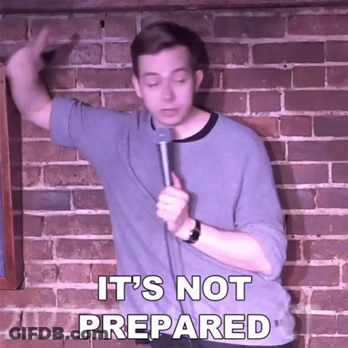 Man In Front Of Brick Wall Holding Microphone Saying It's Not Prepared GIF
