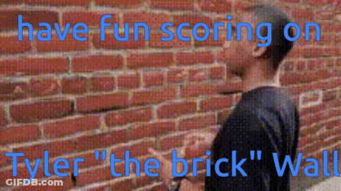 Man In Front Of Brick Wall Saying Have Fun Scoring On Tyler The Brick Wall GIF