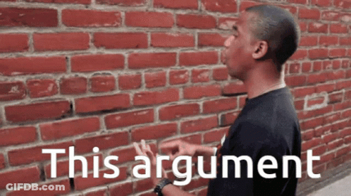 Man In Front Of Brick Wall Saying This Argument GIF