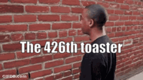Man In Front Of Brick Wall The 428Th Toaster GIF
