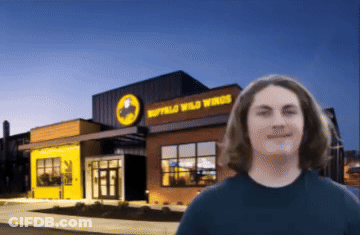 Man In Front Of Buffalo Wild Wings GIF