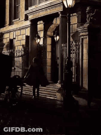 Man In Front Of Building Saying A Tell Me Or I Swear GIF
