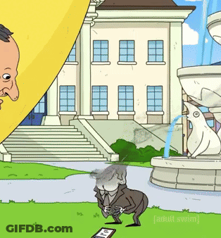 Man In Front Of Building With Fountain And Penguin GIF