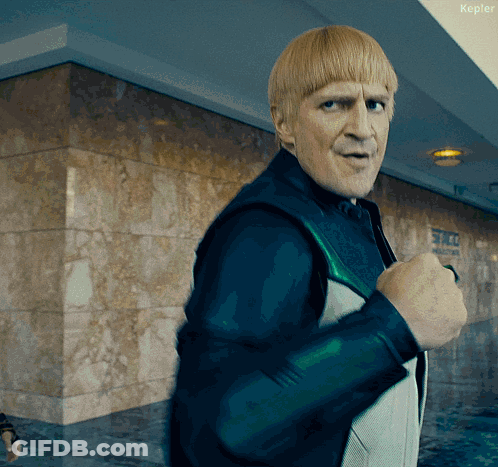 Man In Front Of Building With Kepler Sign GIF