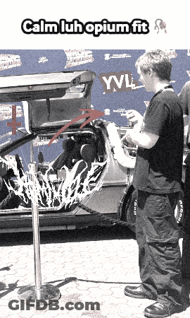 Man In Front Of Car Saying Yvl GIF