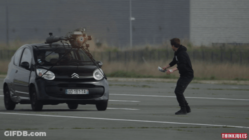 Man In Front Of Car With License Plate DD 161 TA GIF