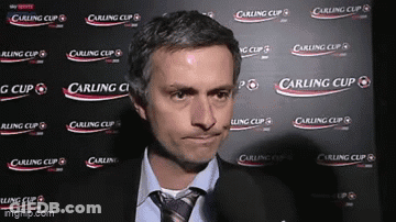 Man In Front Of Carling Cup Wall GIF