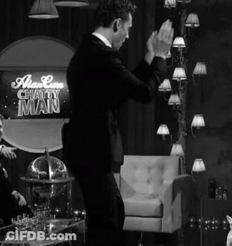 Man In Front Of Chatty Man Sign GIF