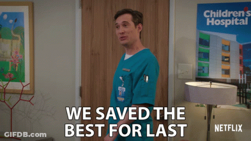 Man In Front Of Children's Hospital Sign GIF