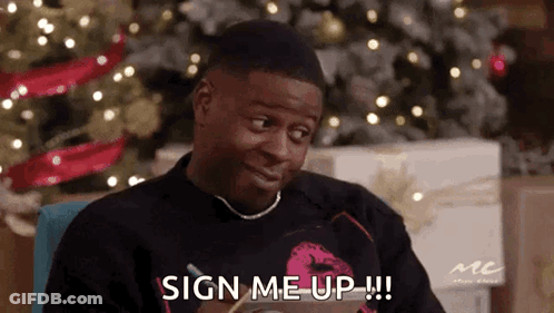 Man In Front Of Christmas Tree Saying Sign Me Up GIF