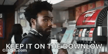 Man In Front Of Coca Cola Machine Saying Keep It On The Downlow GIF