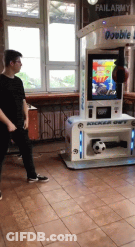 Man In Front Of Double Kicker Out Machine GIF