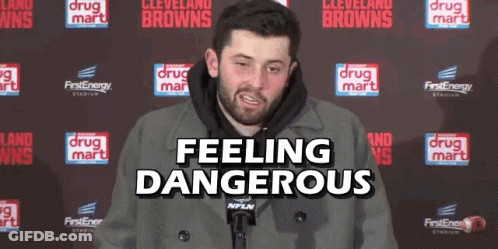 Man In Front Of Drug Mart Wall GIF