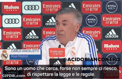 Man In Front Of Emirates Advertisements GIF