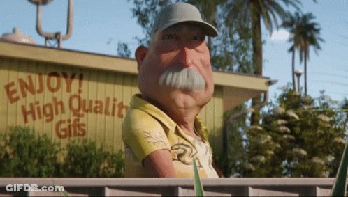 Man In Front Of Enjoy High Quality Gifts Sign GIF