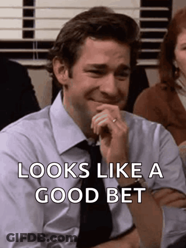 Man In Front Of Enjoy High Quality Gifts Sign GIF
