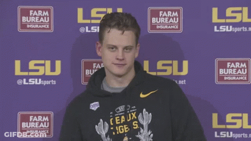 Man In Front Of Farm Bureau Insurance GIF