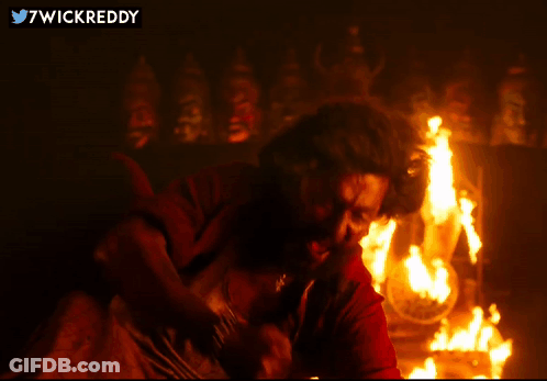 Man In Front Of Fire 7Wickreddy GIF