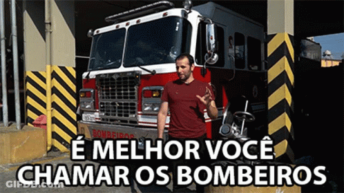 Man In Front Of Fire Truck Melhor Você Chamar Os Bombeiros GIF