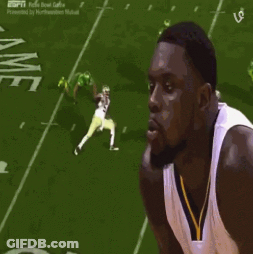 Man In Front Of Football Field Number 40 GIF