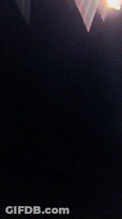 Man In Front Of Green Toyota Sign GIF