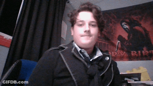 Man In Front Of Happy Birthday Poster GIF