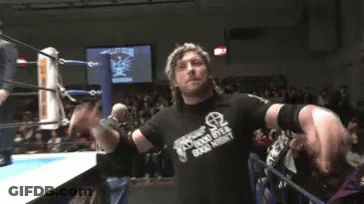 Man In Front Of IWGP Screen GIF