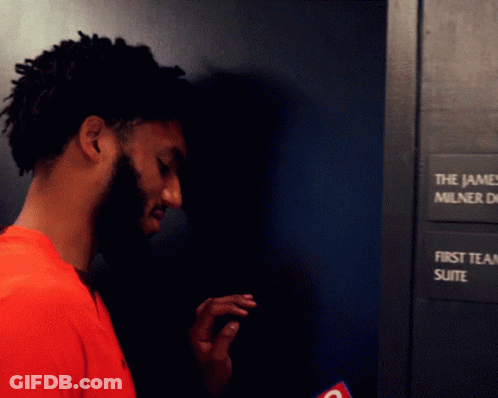 Man In Front Of James Milner D First Team Suite Sign GIF