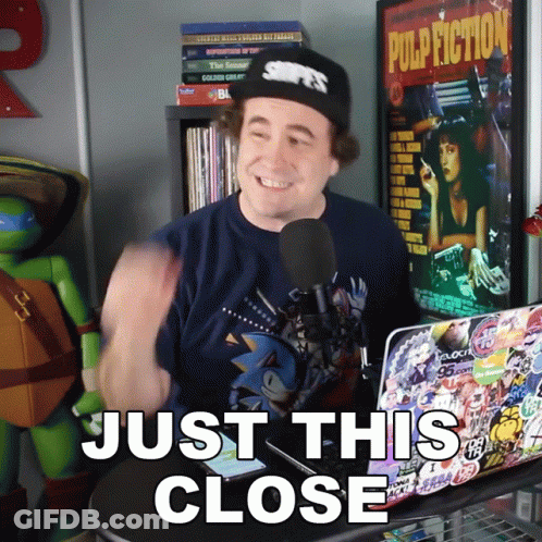 Man In Front Of Laptop Saying Just This Close GIF