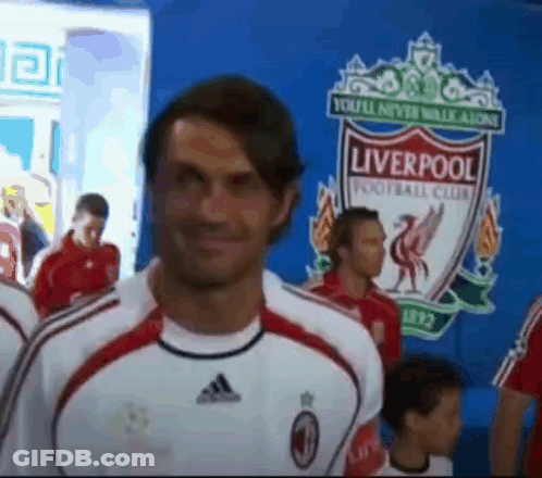 Man In Front Of Liverpool FC Logo GIF