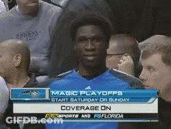 Man In Front Of Magic Playoffs Screen GIF