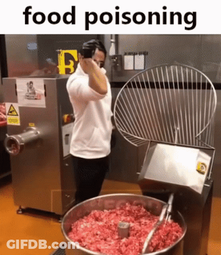 Man In Front Of Meat Grinder Food Poisoning GIF