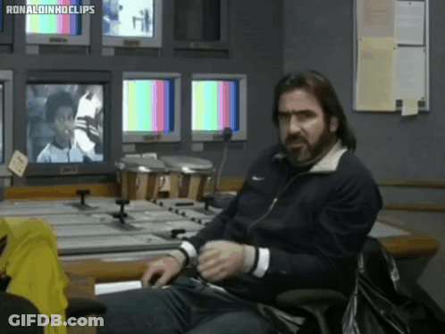 Man In Front Of Monitors With Ronaldinho Clips GIF