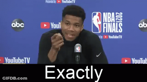Man In Front Of NBA Finals Sign GIF