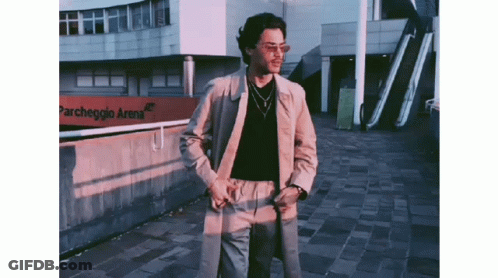 Man In Front Of Parcheggio Arena GIF