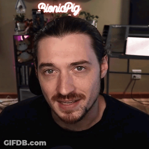 Man In Front Of Picnicpig Sign GIF