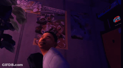 Man In Front Of Racing On Poster GIF