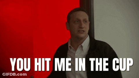 Man In Front Of Red Door Saying You Hit Me In The Cup GIF