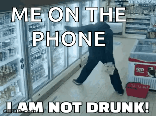 Man In Front Of Refrigerator Saying Me On The Phone I Am Not Drunk GIF