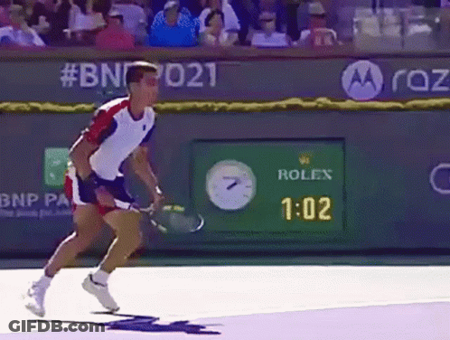 Man In Front Of Rolex Advertisement GIF