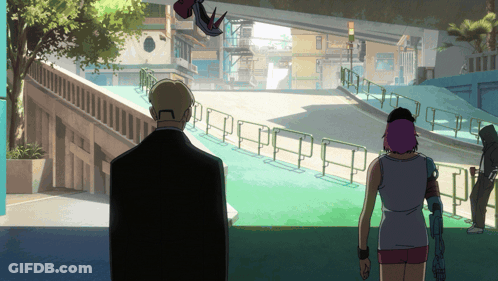 Man In Front Of Roller Coaster Saying 7 Imperil Mall GIF